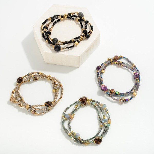 Set of Three Faceted And Stone Beaded Stretch Bracelet Set

- Approximately 2.5" D 