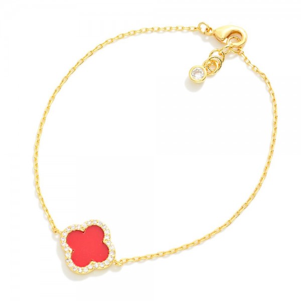 Gold Dipped Chain Link Bracelet Featuring Clover Station With Rhinestone Border 

- Approximately 3" D
- .75" Extender 