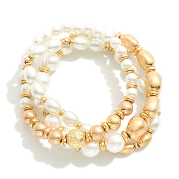 Set of Three Pearl Beaded Stretch Bracelets Featuring Metal Tone Beads

- Approximately 2.5" D