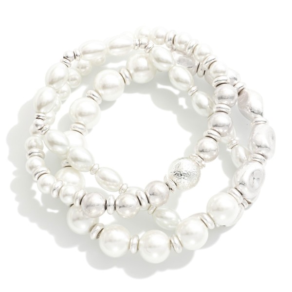 Set of Three Pearl Beaded Stretch Bracelets Featuring Metal Tone Beads

- Approximately 2.5" D