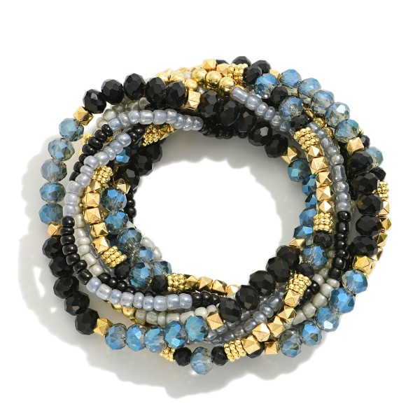 Set Of Ten Beaded Stretch Bracelets Featuring Metal Tones and Glass Seed Beads

- Approximately 2.5" D