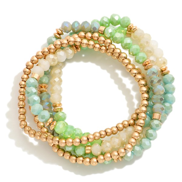 Set of Five Beaded Stretch Bracelets Featuring Gold Tone and Faceted Beads

- Approximately 2.5" D