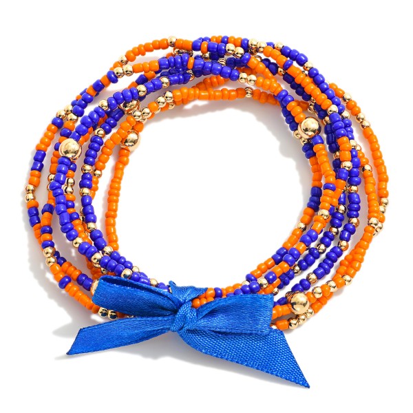 Set of Seven Game Day Beaded Stretch Bracelets Featuring Ribbon Bow Detail

- Approximately 2.5"