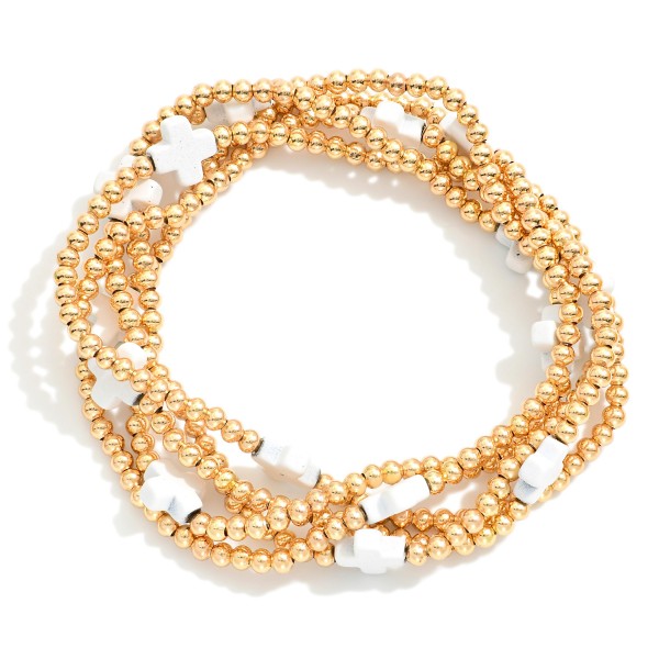 Set of Five Gold Tone Beaded Stretch Bracelets Featuring Criss Cross Bead Stations

- Approximately 2.5" D