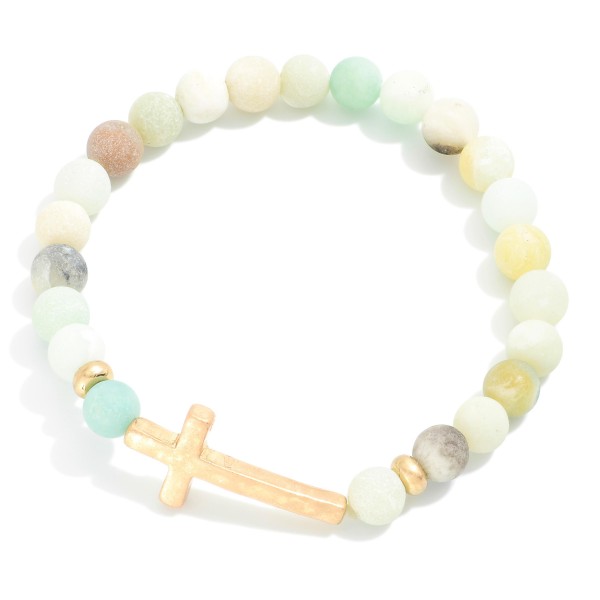 Stone Beaded Stretch Bracelet Featuring Hammered Metal Cross Station

- Approximately 2.5" D