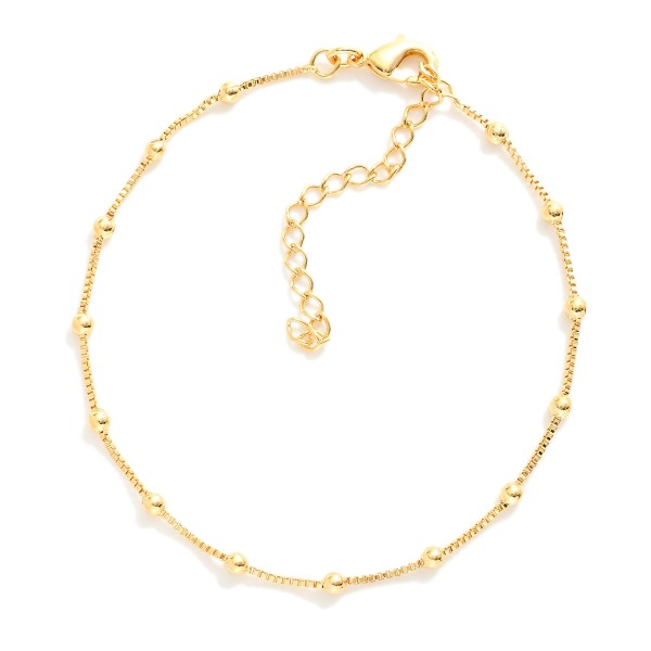 Box Chain Bracelet Featuring Metal Tone Beads 

- Approximately 7" L
- Extender 2" L
- 18k Gold Filled
- Hypoallergenic
- Made In Brazil