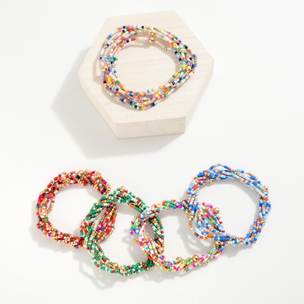 Set Of Six Seed Beaded Stretch Bracelets Featuring Metal Tones 
- Approximately 3" L