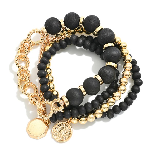 Set of Four Wood beaded Bracelets With Gold Tones Featuring Coin Charms 

- Approximately 2.5" D