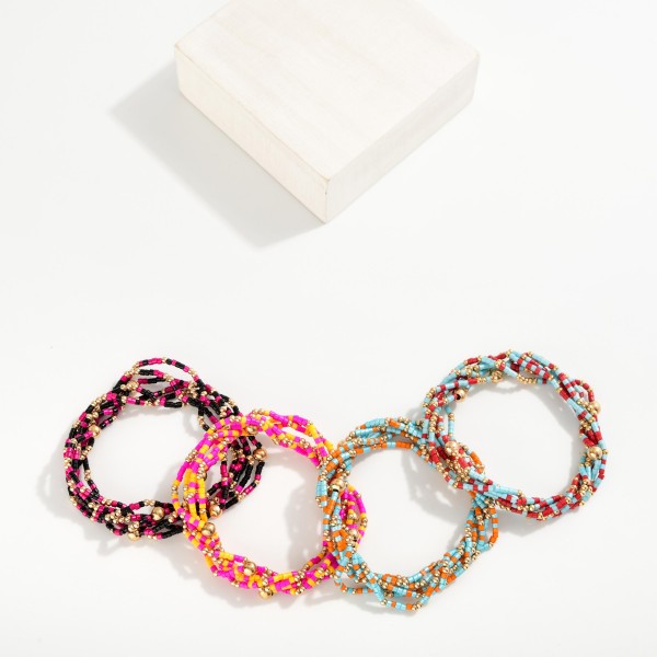 Set Of Six Seed Beaded Stretch Bracelets Featuring Metal Tones 
- Approximately 3" L