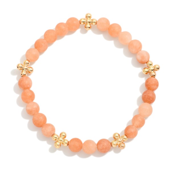 Stone Beaded Stretch Bracelet Featuring Gold Tone Bubble Criss Cross Stations 

- Approximately 2.25" D
