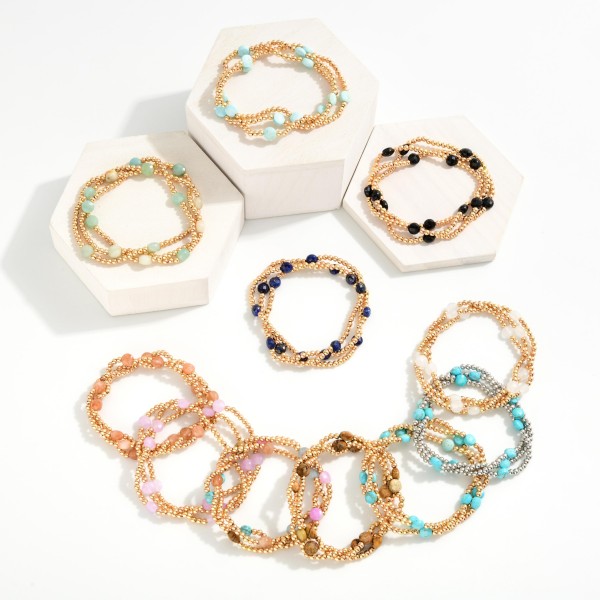 Metal Tone Beaded Stretch Bracelets Featuring Faceted Stone Beads 
- Approximately 2.5" D