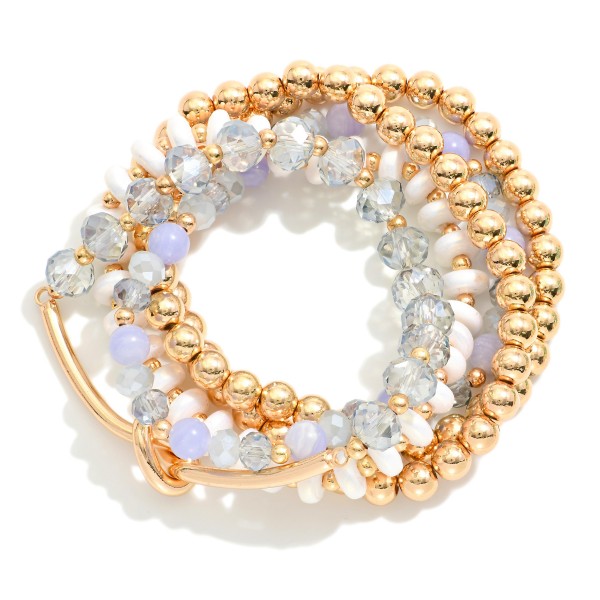 Set of Five Beaded Stretch Bracelets Featuring Glass Beads, Faceted Beads, and Gold Tone Noted Wire Tube Detail

- Approximately 2.5" D

