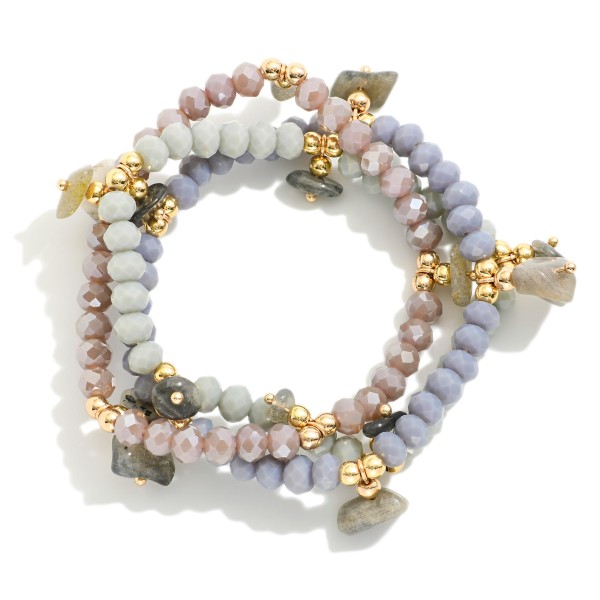 Set Of Three Beaded Stretch Bracelets Featuring Gold Tones of & Stone Charms 

- Approximately 2.75" D