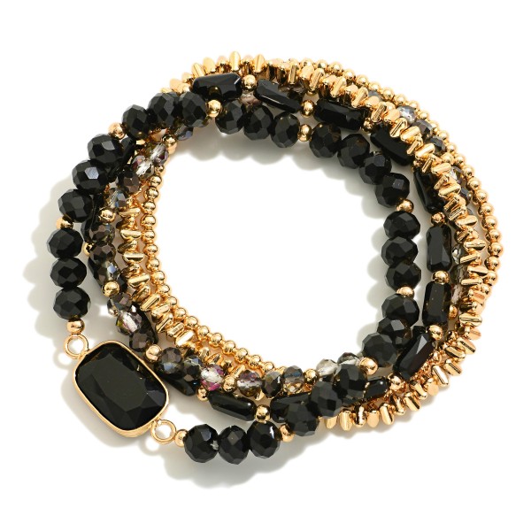 Set Of Five Beaded Stretch Bracelets Featuring Metal Tones, Faceted Beads, & Glass Crystal Accent

- Approximately 2.5" D

