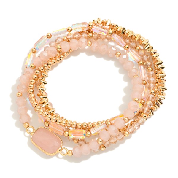 Set Of Five Beaded Stretch Bracelets Featuring Metal Tones, Faceted Beads, & Glass Crystal Accent

- Approximately 2.5" D

