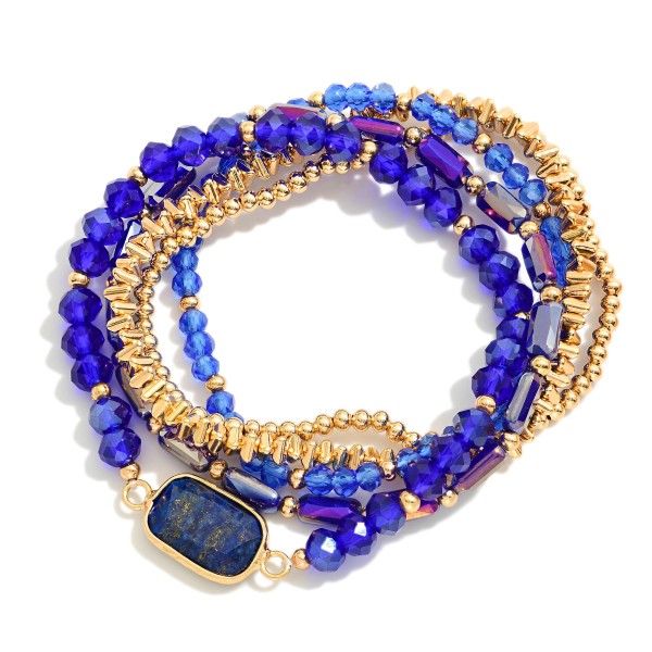 Set Of Five Beaded Stretch Bracelets Featuring Metal Tones, Faceted Beads, & Glass Crystal Accent

- Approximately 2.5" D

