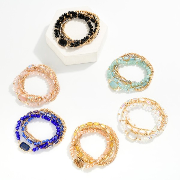Set Of Five Beaded Stretch Bracelets Featuring Metal Tones, Faceted Beads, & Glass Crystal Accent

- Approximately 2.5" D

