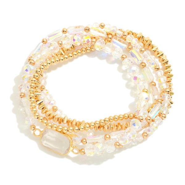 Set Of Five Beaded Stretch Bracelets Featuring Metal Tones, Faceted Beads, & Glass Crystal Accent

- Approximately 2.5" D

