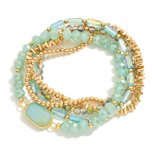 Set Of Five Beaded Stretch Bracelets Featuring Metal Tones, Faceted Beads, & Glass Crystal Accent

- Approximately 2.5" D

