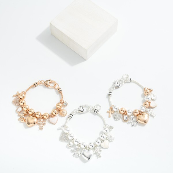 Snake Chain Bracelet featuring Metal Tone Chunky Beads, Hearts & Crosses 

- Approximately 2.5" D