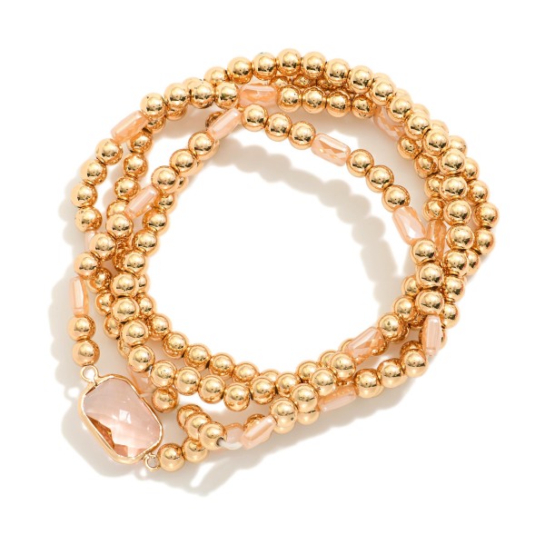 Set Of Four Metal Tone Beaded Stretch Bracelets Featuring Faceted Beads & Glass Crystal 

- Approximately 2.5" D