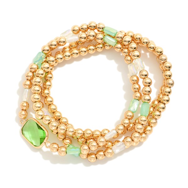 Set Of Four Metal Tone Beaded Stretch Bracelets Featuring Faceted Beads & Glass Crystal 

- Approximately 2.5" D