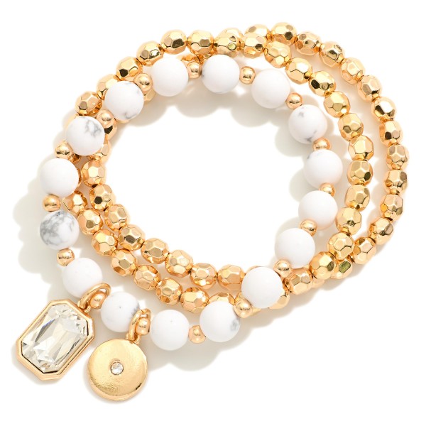Set Of Three Beaded Stretch Bracelets Featuring Metal Tones & Semi Precious Stones 

- Approximately 3" D