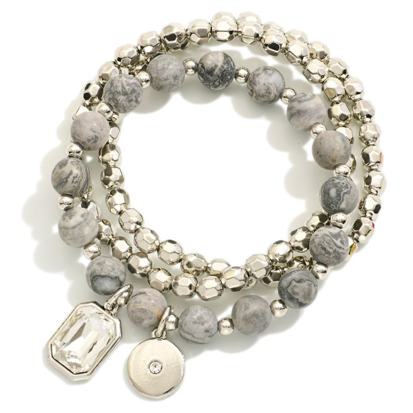 Set Of Three Beaded Stretch Bracelets Featuring Metal Tones & Semi Precious Stones 

- Approximately 3" D