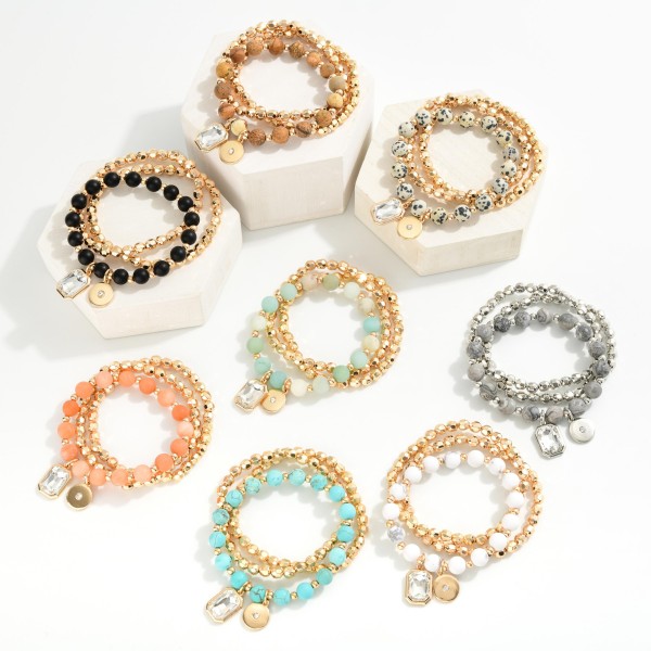 Set Of Three Beaded Stretch Bracelets Featuring Metal Tones & Semi Precious Stones 
- Approximately 3" D