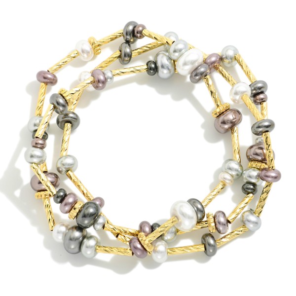 Set Of Three Beaded Stretch Bracelets Featuring Metal Tones & Pearls

- Approximately 3.25" D

