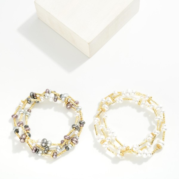 Set Of Three Beaded Stretch Bracelets Featuring Metal Tones & Pearls

- Approximately 3.25" D

