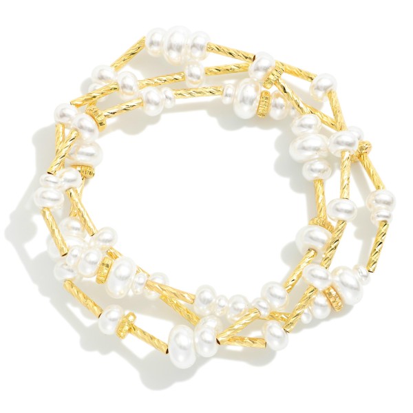 Set Of Three Beaded Stretch Bracelets Featuring Metal Tones & Pearls

- Approximately 3.25" D

