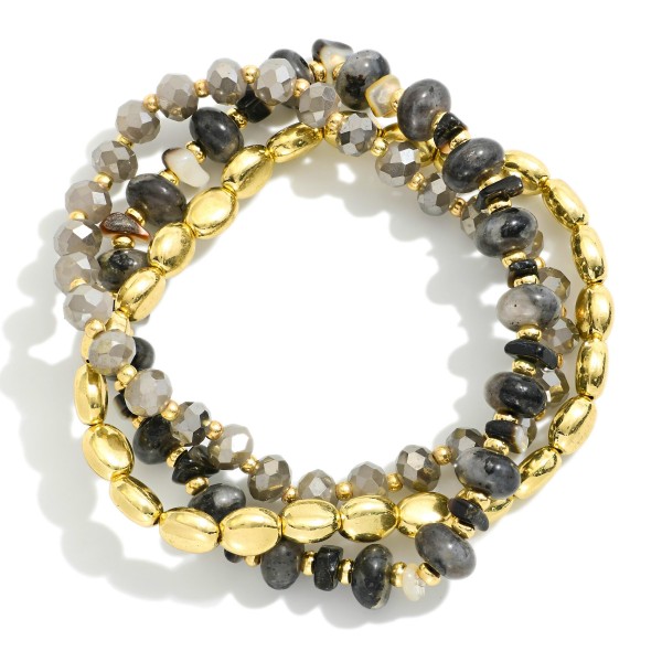 Set Of Three Beaded Stretch Bracelets Featuring Metal Tones, Faceted Beads, & Stone 

- Approximately 3.25
