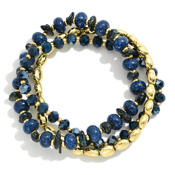 Set Of Three Beaded Stretch Bracelets Featuring Metal Tones, Faceted Beads, & Stone 

- Approximately 3.25