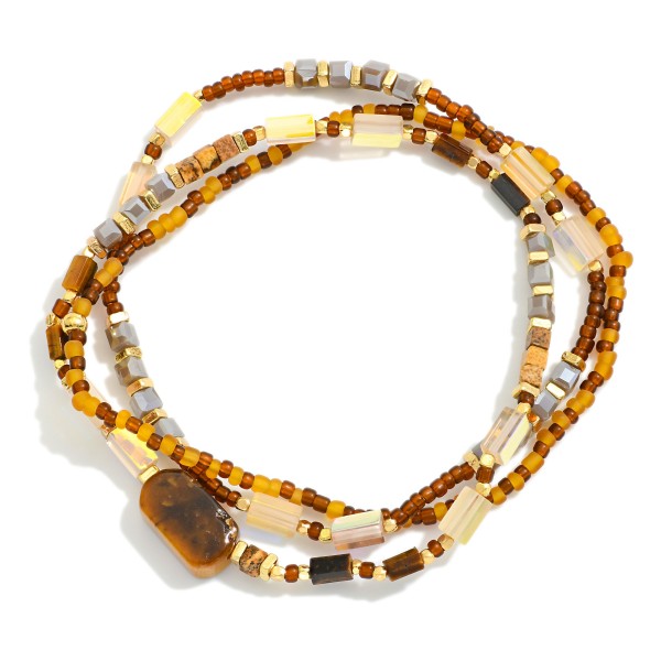 Set Of Three Beaded Stretch Bracelets Featuring Gold Tones & Faceted Stone Beads 

-Approximately 3.50" D 