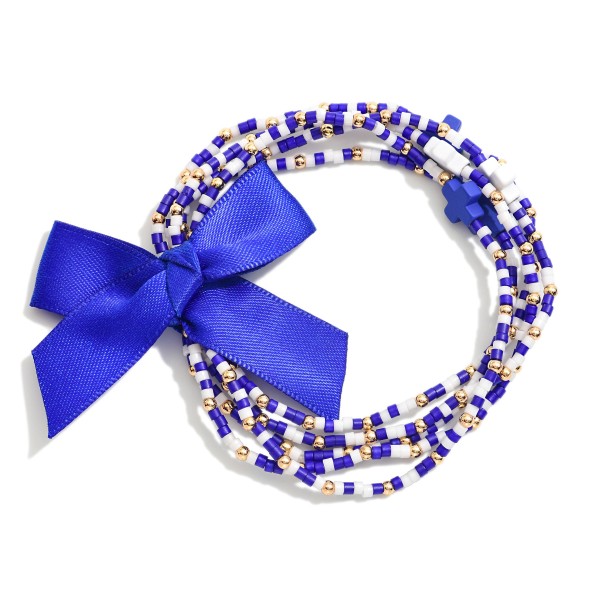 Set of Five Game Day Beaded Stretch Bracelets Featuring Ribbon Bow Detail And Criss Cross Bead Stations

- Approximately 2.5"