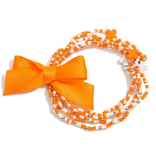 Set of Five Game Day Beaded Stretch Bracelets Featuring Ribbon Bow Detail And Criss Cross Bead Stations

- Approximately 2.5"