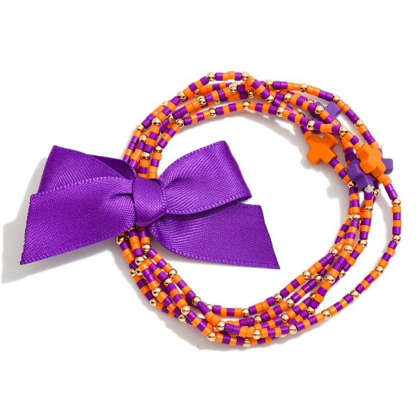 Set of Five Game Day Beaded Stretch Bracelets Featuring Ribbon Bow Detail And Criss Cross Bead Stations

- Approximately 2.5"