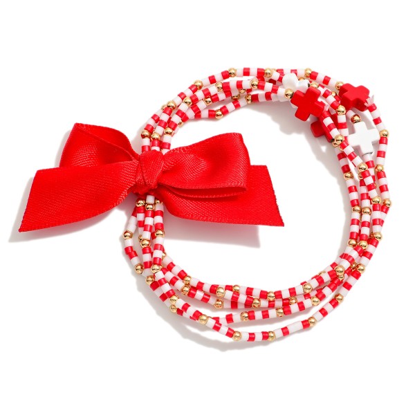Set of Five Game Day Beaded Stretch Bracelets Featuring Ribbon Bow Detail And Criss Cross Bead Stations

- Approximately 2.5"