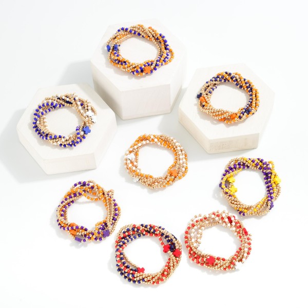 Set Of Six Beaded Stretch Bracelets Featuring Metal Tones & Plus Cross Beads 
- Approximately 2.5" D