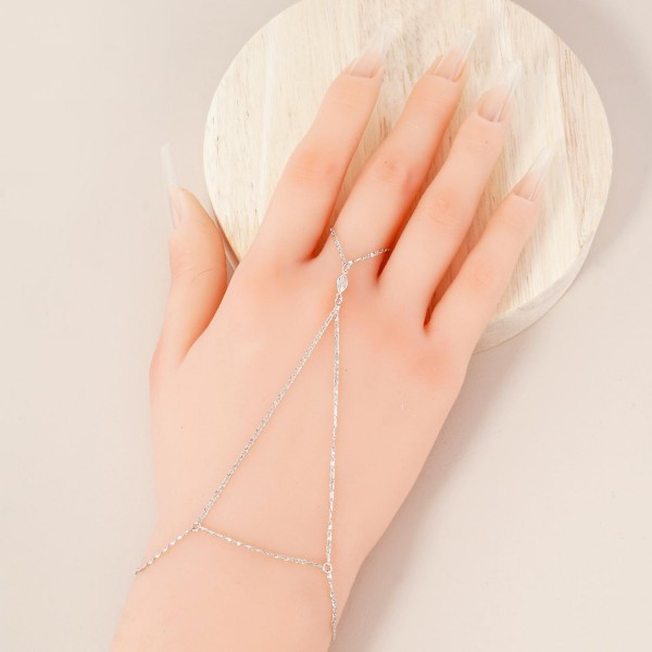 Chain Link Hand Chain Bracelet Featuring Glass Crystal Detail 

- Gold Dipped 
- Approximately 3" D
