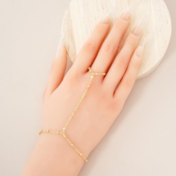 Chain Link Hand Chain Bracelet Featuring Glass Crystal & Metal Bead Stations 

- Gold Dipped 
- Approximately 3" D
