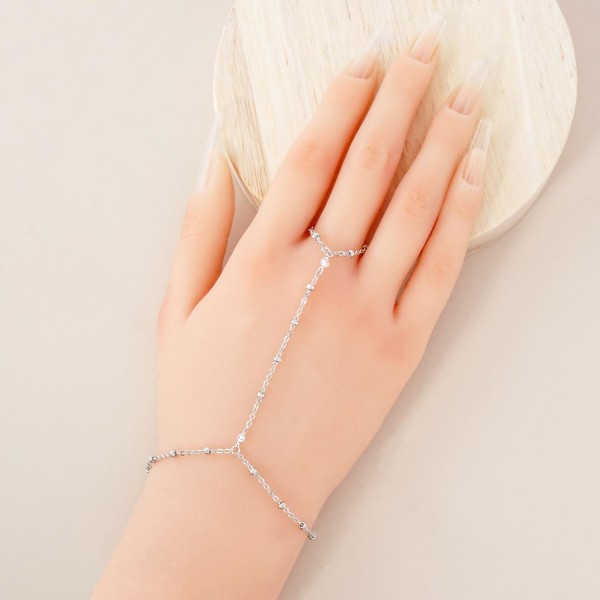 Chain Link Hand Chain Bracelet Featuring Glass Crystal & Metal Bead Stations 

- Gold Dipped 
- Approximately 3" D

