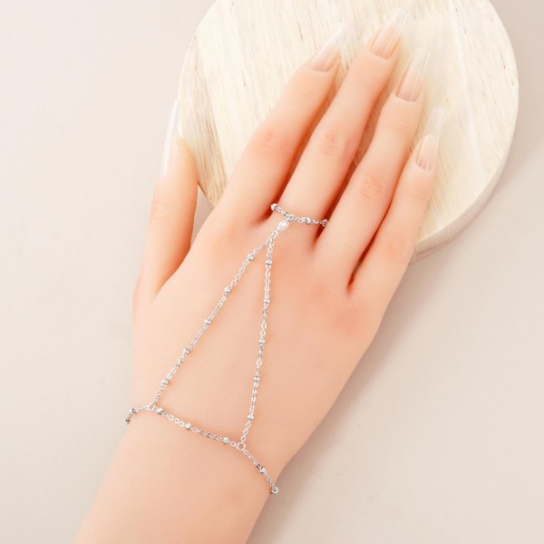 Chain Link Hand Chain Bracelet Featuring Glass Crystal & Metal Bead Stations 

- Gold Dipped 
- Approximately 3" D
