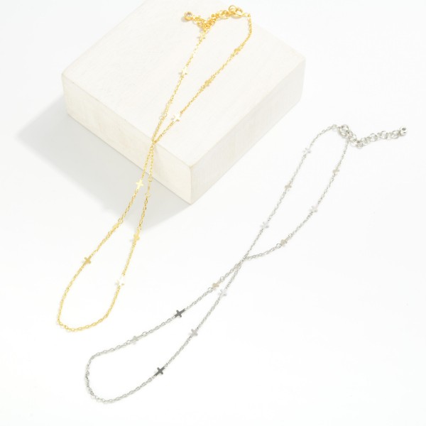 Chain Link Hand Chain Bracelet Featuring Metal Tone Cross Stations 

 - Gold Dipped 
- Approximately 3" D
- Extender 2" L