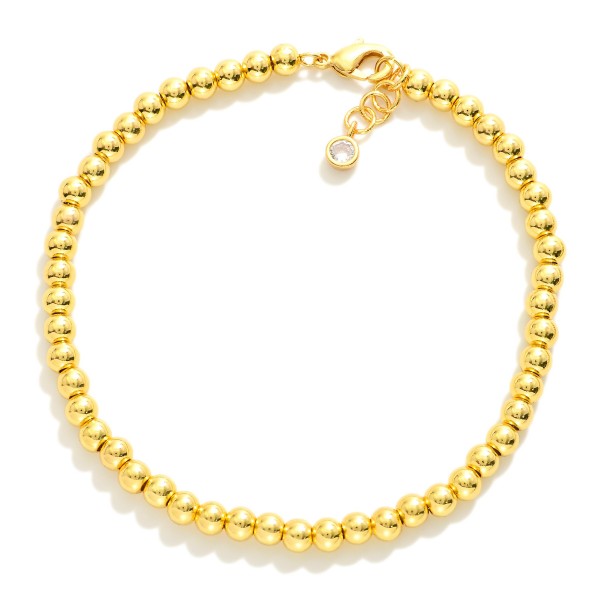 Metal Tone Beaded Bracelet 

- Gold Dipped
- Approximately 3" L
- Extender 1" L