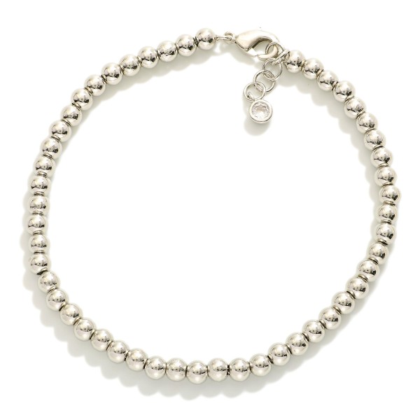 Metal Tone Beaded Bracelet 

- Gold Dipped
- Approximately 3" L
- Extender 1" L