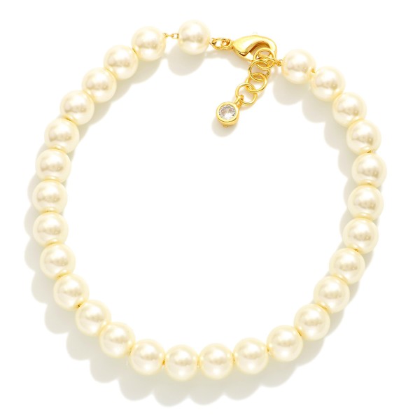 Pearl Beaded Bracelet

- Gold Dipped
- Approximately 3" L
- Extender 1" L