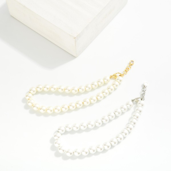 Pearl Beaded Bracelet

- Gold Dipped
- Approximately 3" L
- Extender 1" L
