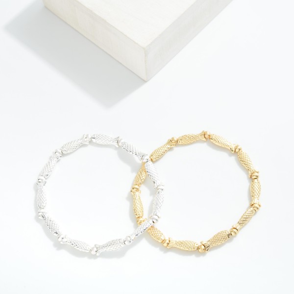 Metal Tone Fish Stretch Bracelet 

- Approximately 2.25" D